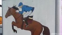 Menyambut Asian Games, ada mural bergambar cabang-cabang olahraga (Foto: Eva Safitri/detikcom)