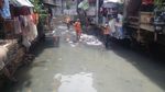 Before-After Kali Jati Bunder yang Dibersihkan Pasukan Oranye