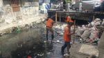 Before-After Kali Jati Bunder yang Dibersihkan Pasukan Oranye