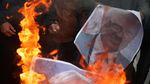 Foto Trump Dibakar dan Diinjak-injak di Gaza