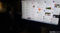 Layar besar itu berwarna hitam. Memang ada kamera di atas layar itu yang sepertinya alat untuk teleconference. Saat menggunakan TweetDeck, terlihat beberapa akun Twitter yang dipantau Fadli. Fadli sendiri mengaku mengontrol sendiri TweetDeck tersebut.