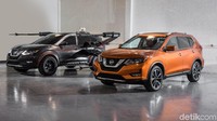 Selanjutnya modifikasi berbasis mobil Nissan Rouge. Bisa dibilang ini mobil konsep yang paling liar dari semuanya. SUV ini telah dilengkapi dengan sayap lebar di kedua sisi, meriam quad laser, dan lluminating thrusters. (Nissan).
