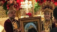 Keduanya menggelar akad dengan adat Palembang terlebih dahulu. Foto: Istimewa