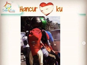 Ini Tentang Menggendong Anak di Belakang Saat Naik Motor