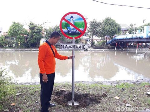 Rambu dilarang memancing/
