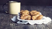 Bergeser ke Afrika Selatan, Anda harus mencicip koeksister yakni kue tradisional yang disajikan dengan sirup sebagai sumber rasa manis. Foto: Istimewa