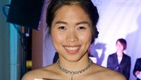 Ratchanok Intanon (Thailand) mengenakan long dress merah. Cantik, ya? (BWF)