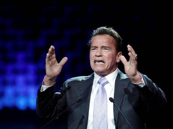 R20 Founder and former California state governor Arnold Schwarzenegger delivers a speech during the One Planet Summit at the Seine Musicale center in Boulogne-Billancourt, near Paris, France, December 12, 2017. REUTERS/Benoit Tessier
