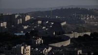 Pemandangan di kota Yerusalem Timur pada 4 Desember 2017. Pemerintah Israel membuat perbatasan dengan Palestina. Foto: REUTERS/Ammar Awad