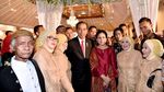 Potret Jokowi-Iriana Kondangan ke Pernikahan Pengawalnya