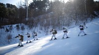 Mereka menyusuri wilayah di Pyeongchang untuk berlatih.