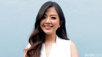 Aura kebahagiaan terpancar dari wajahnya kala berpose. Pool/Noel/detikFoto.