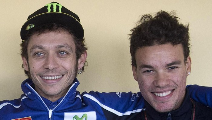 VALENCIA, SPAIN - NOVEMBER 08:  (L-R) Niccolo Antonelli of Italy and Junior Team Go&Fun Moto3, Valentino Rossi of Italy and Movistar Yamaha MotoGP and Franco Morbidelli of Italy and Italtrans Racing Team pose during the press conference during the MotoGP of Valencia - Qualifying at Ricardo Tormo Circuit on November 8, 2014 in Valencia, Spain.  (Photo by Mirco Lazzari gp/Getty Images)