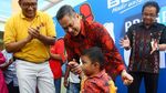 Melihat Kebahagiaan Para Penerima Kaki Palsu