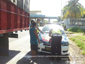 Puluhan Truk Ditilang dan Dipaksa Keluar dari Tol Jakarta-Cikampek