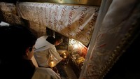 Misa berlangsung khidmat (Foto: Dok. REUTERS/Mussa Qawasma)