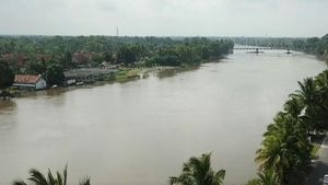 Foto: Penampakan Sungai Ogan yang Meluap Rendam 6 Kecamatan