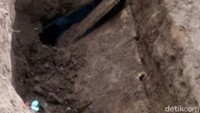 Penampakan makam warga yang dibongkar orang misterius. 