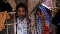 Saddam Hussein berfoto dengan istrinya Shofika Begum, 16 Dsember, 5 hari setelah menikah. Marko Djurica/Reuters.