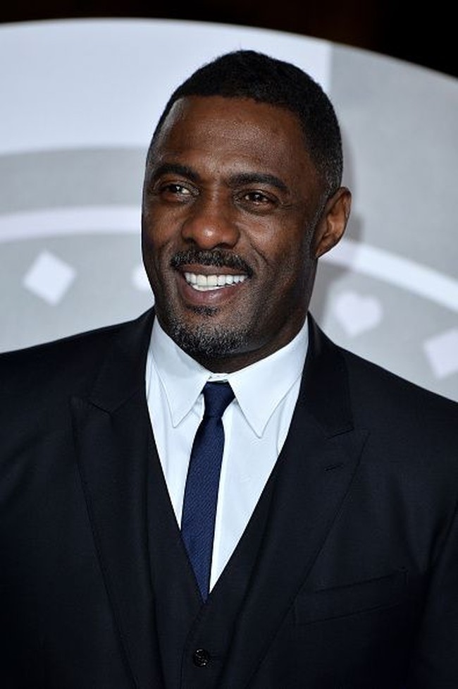 Idris Elba sering terpilih sebagai pria terseksi. Kali ini, ia masuk daftar pria tertampan di urutan ketujuh. Foto: Instagram/Getty Images