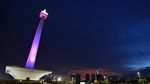 Foto: Memanjat Pohon Demi Rayakan Tahun Baru di Monas