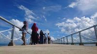 Selain bermain air, pengunjung juga bisa berfoto di kawasan pantai (Muhammad Iqbal/detikTravel)