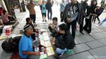 Peramal Garis Tangan Laris Manis di Kota Tua