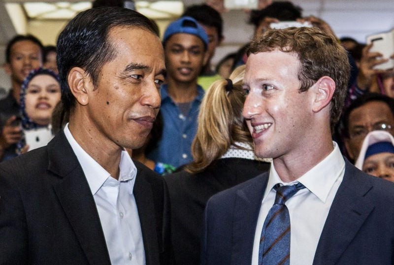 JAKARTA, INDONESIA - OCTOBER 13:  Indonesian President-elect Joko Widodo (L) with Facebook founder Mark Zuckerberg (R) at Tanah Abang Market the biggest textile market in South East Asia after meeting on October 13, 2014 in Jakarta, Indonesia. Mark Zukerberg is visiting Indonesia to attend Internet developers summit and meet heads of goverment. Indonesia is a country that has a population of 240 million and has approximately 60 million active users of social media  (Photo by Oscar Siagian/Getty Images)