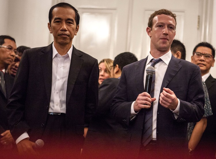 JAKARTA, INDONESIA - OCTOBER 13:  Indonesian President-elect Joko Widodo (L) with Facebook founder Mark Zuckerberg (R) at Tanah Abang Market the biggest textile market in South East Asia after meeting on October 13, 2014 in Jakarta, Indonesia. Mark Zukerberg is visiting Indonesia to attend Internet developers summit and meet heads of goverment. Indonesia is a country that has a population of 240 million and has approximately 60 million active users of social media  (Photo by Oscar Siagian/Getty Images)