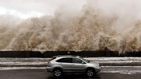 Foto ini diambil di New Brighton Inggris pada Rabu (3/1) kemarin. Foto: AFP PHOTO / Paul ELLIS