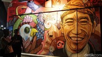 Mural tokoh-tokoh dalam dan luar negeri memanjang dari Ngarsopuro menuju Jalan Singosaren. Salah satu yang paling populer adalah mural Presiden Joko Widodo (Randy/detikTravel)