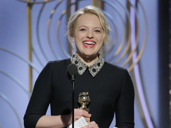 BEVERLY HILLS, CA - JANUARY 07:  In this handout photo provided by NBCUniversal, Elisabeth Moss accepts the award for Best Performance by an Actress in a Television Series – Drama for “The Handmaid’s Tale”  speaks onstage during the 75th Annual Golden Globe Awards at The Beverly Hilton Hotel on January 7, 2018 in Beverly Hills, California.  (Photo by Paul Drinkwater/NBCUniversal via Getty Images)
