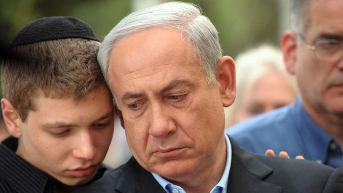 Benjamin Netanyahu and Yair at Ben Zion Netanyahus funeral, 2012.