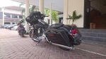 Foto: Ini Gaya Nyentrik Plt Wali Kota Cilegon Ngantor Naik Harley
