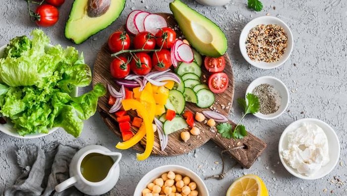 Street vendors vegetable salads sold outdoors. Snacks closeup, in craft package. Fast food for commercial kitchen.