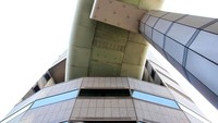 Jalan tol tersebut menembus ke lantai 5, 6 dan 7 gedung Gate Tower. Istimewa/Forbes.