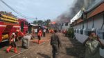 Foto: Api Membara dan Asap Membubung di Museum Bahari
