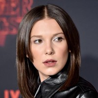 Millie yang makin cantik dan dewasa, kini rambutnya berpotongan long bob yang ditata lurus. Foto: Getty Images