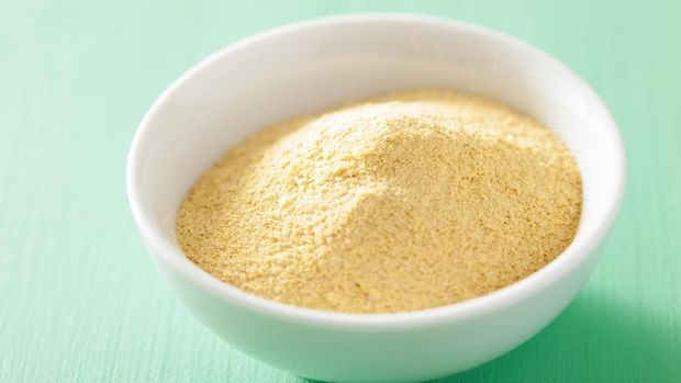 vegan nutritional yeast flakes in bowl