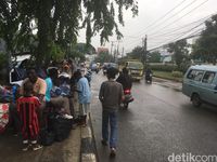 Hujan Reda, Para Pencari Suaka di Kalideres Kembali 