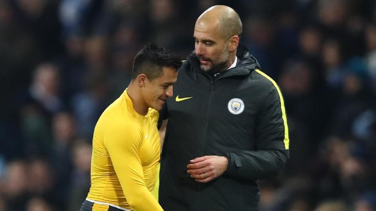 Alexis Sanchez dan Pep Guardiola (Clive Brunskill/Getty Images)