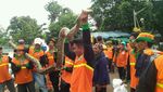 Foto: Tanpa Perlawanan, Ini Ular Sanca yang Ditangkap Pasukan Oranye