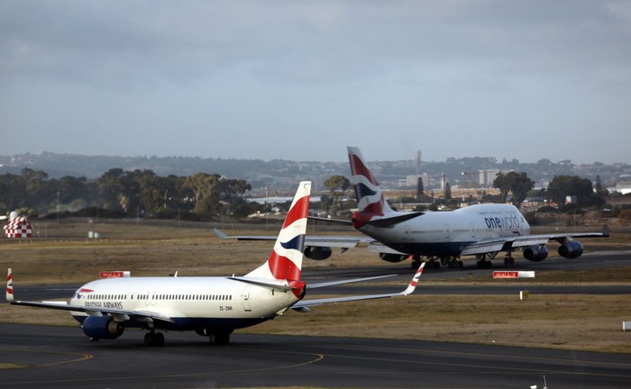 A British Airways Boeing 747 passenger aircraft prepares to take off as passengers wait to board a flight in Cape Town International airport in Cape Town, South Africa, January 12, 2018. Picture taken January 12 2018. REUTERS/Hannah McKay