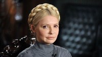 Model rambut dikepang ini disebut memberi pesan politik tersendiri. Gaya rambut Yulia ini pun banyak ditiru (Foto: AFP)