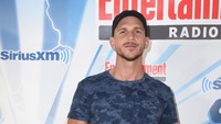 Kepala plontos dan brewok menjadi pembedanya dengan saudaranya itu. Vivien Killilea/Getty Images for SiriusXM.