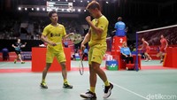 Kevin/Marcus merayakan kemenangan.