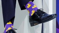 Di tengah sesi, kaos kaki unik yang dipakai oleh Trudeau tertangkap kamera.
