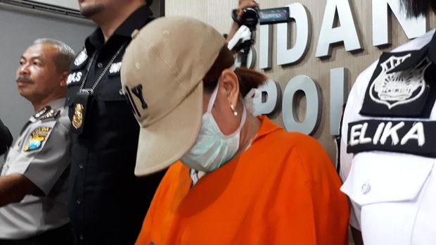 EY, yang ditetapkan sebagai tersangka