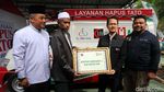 Foto: Ratusan Orang Ikuti Layanan Hapus Tato