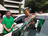  Grab  Siap Jalankan Aturan Transportasi Online